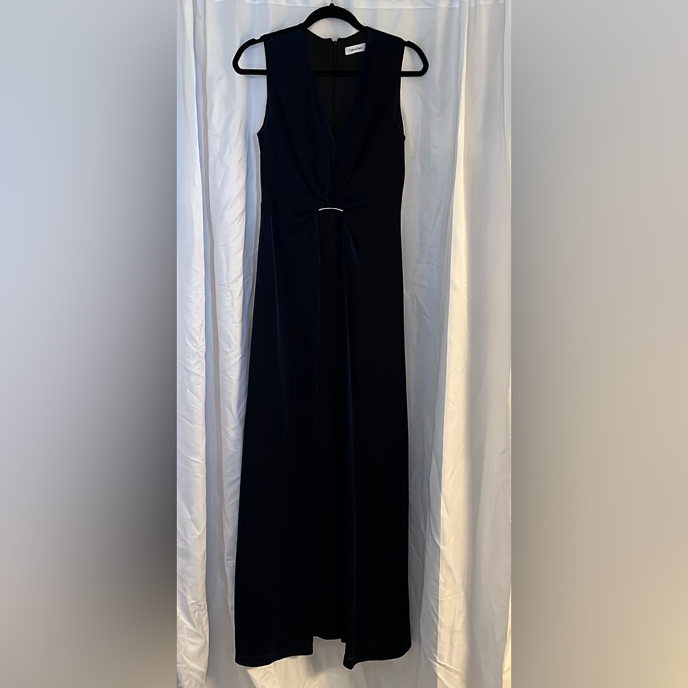 Beautiful shimmer blue, sleeveless formal dress.